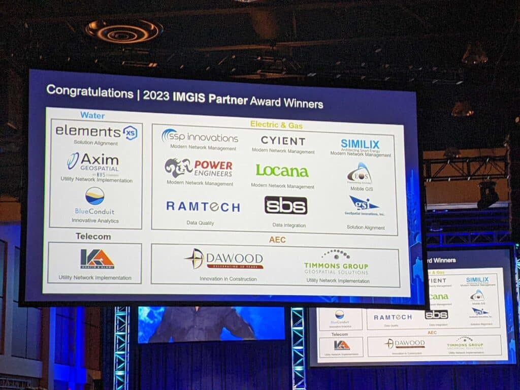 A photo of a slide with logos of partner award winners.